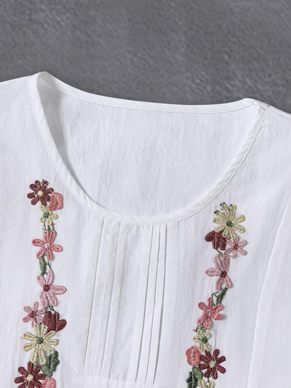 Elegant Long-Sleeve Floral-Trimmed Patchwork Top