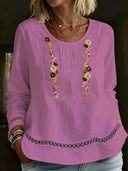 Elegant Long-Sleeve Floral-Trimmed Patchwork Top